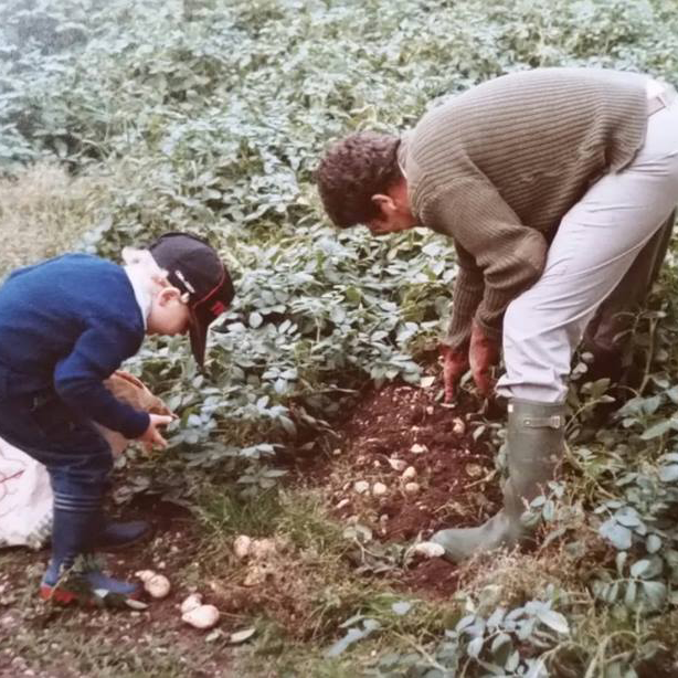 Adam & his grandfather inspecting the potato crop Adam & his grandfather inspecting the potato crop